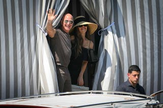 The newlyweds were seen retreating into the Aman Hotel